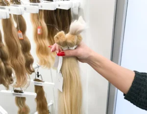 A bundle of hand tied human hair extension wefts