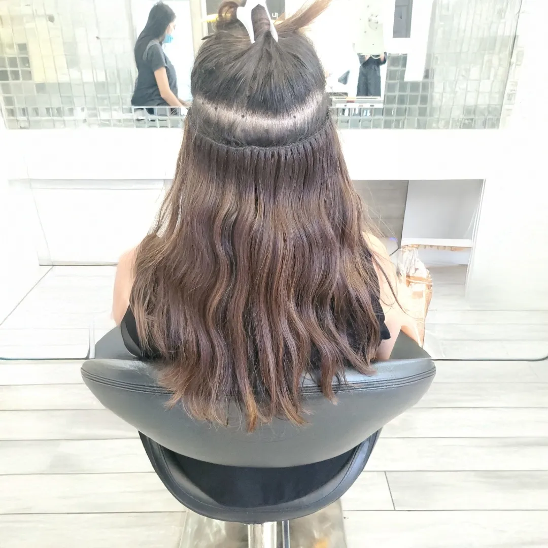 Hair extension weft grow out example